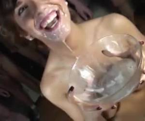 In this semen gangbang, she gets her whole face full of sperm